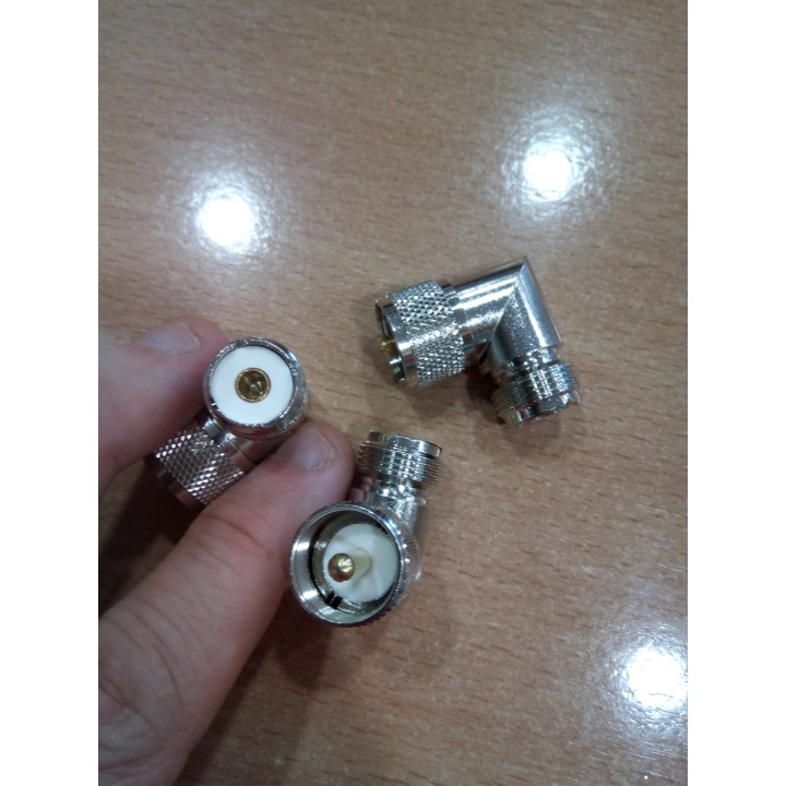 ADAPTADOR PL MACHO A PL HEMBRA ACODADO